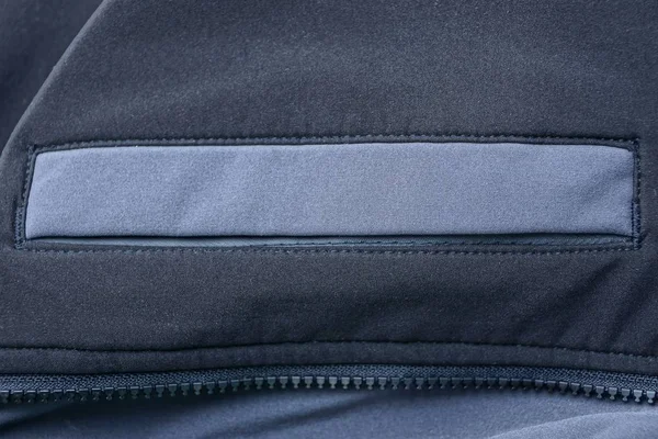 Γκρι Φόντο Μαύρο Ύφασμα Των Ρούχων Μια Τσέπη Και Φερμουάρ — Φωτογραφία Αρχείου