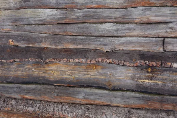 灰色棕色木制背景从一系列的薄板在栅栏的墙壁 — 图库照片