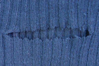 bir delik yırtık elbise gri kumaş dokusu