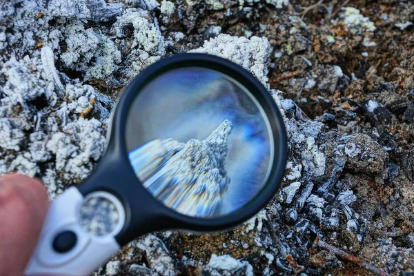 magnifier increases gray white mineral on earth