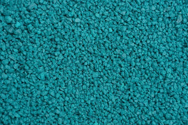 Blue background of fine stone sand