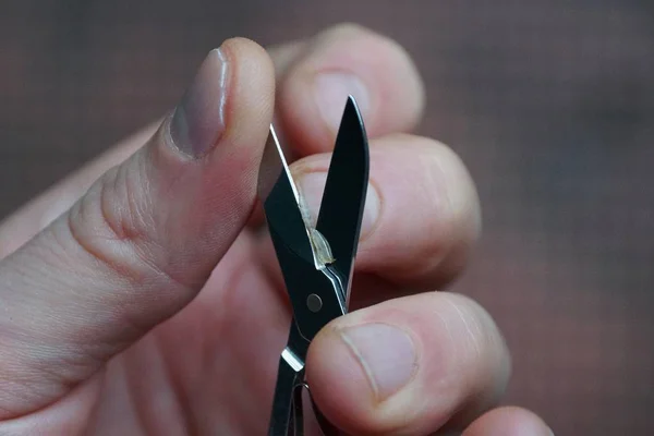 Small Iron Scissors Cut Fingernail Finger — Stock Photo, Image