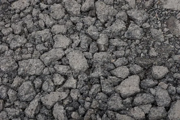 Grauer Steinhintergrund Aus Asphaltstücken Mit Rissen Auf Der Straße — Stockfoto