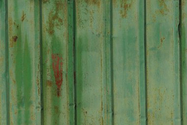 çizgili demir paslı duvarın yeşil metal dokusu