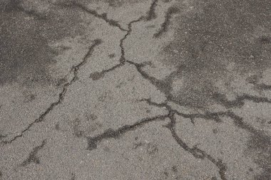 asfalt yolda çatlaklar gri taş doku