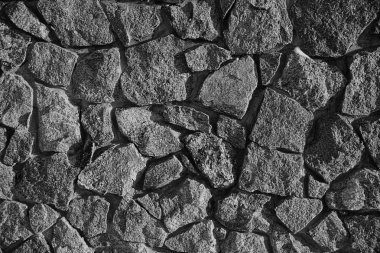 Eski bir evin taş duvarının gri dokusu