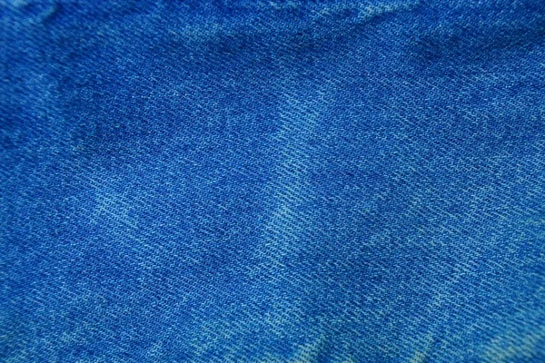 blue cloth texture worn cotton fabric on jeans