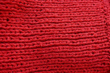 kırmızı kıyafetler kazak yün kumaş dokusuna