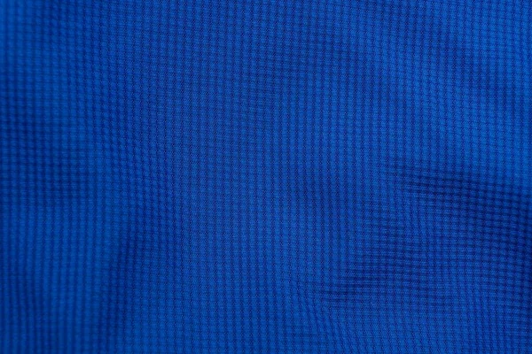 dark blue texture fabric of a piece of crumpled matter