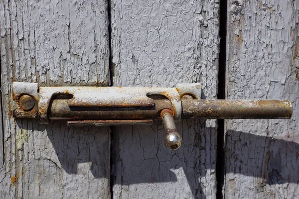 Old Gray Metal Latch Wooden Plank Door — Stock Photo, Image