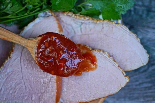 Spoon Red Sauce Slices Chopped Meat Green Parsley Plate — Stock Photo, Image