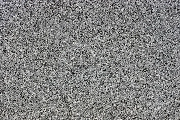 gray stone background from concrete wall in the foundation of the building
