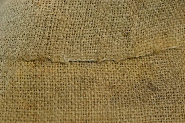 黄麻布のしわに作品からブラウン生地のテクスチャ — ストック写真