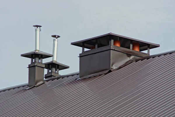 Many Metal Chimney Pipes Brown Roof — Stock Photo, Image