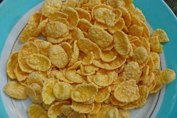 Plate Full Yellow Dried Cornflakes — ストック写真