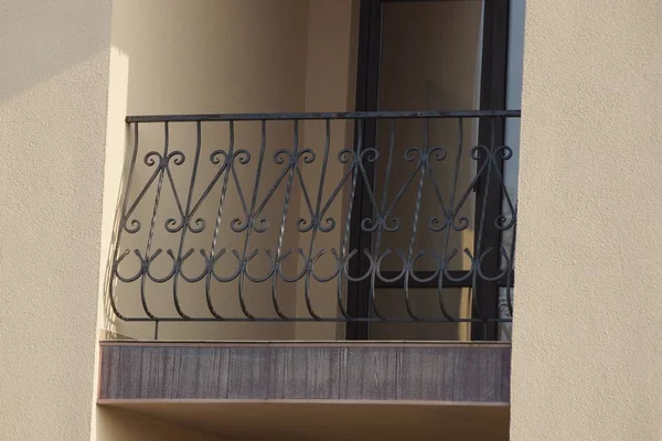 One Black Open Balcony Made Iron Forged Bars Brown Wall — 스톡 사진