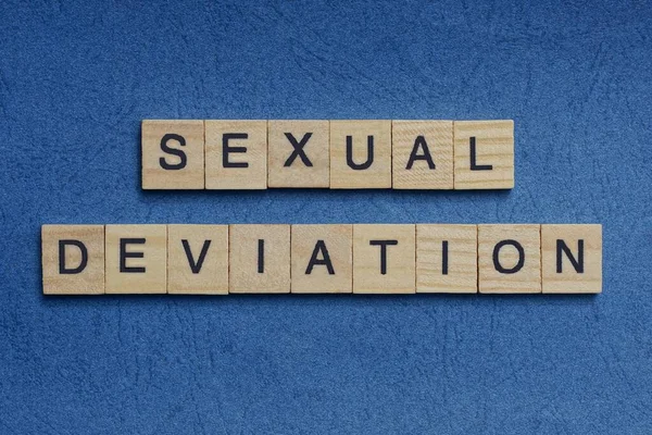 Phrase Sexual Deviation Small Square Wooden Letters Black Font Blue — Stock Photo, Image