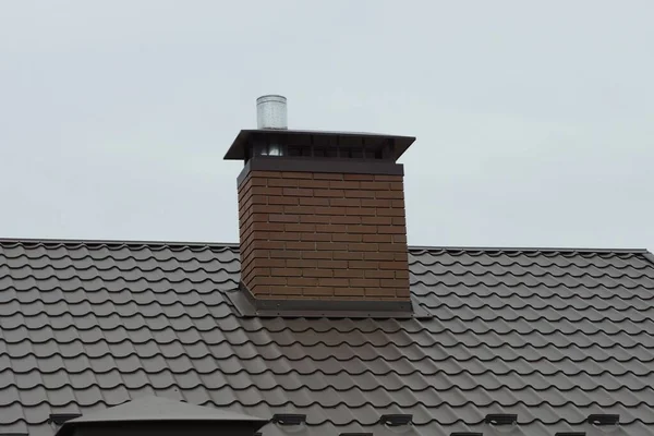 One Brick Chimney Brown Tiled Roof Private House Gray Sky — Stock Photo, Image