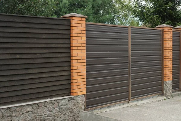 One Brown Metal Gate Part Wall Fence Made Wooden Boards — Stock Photo, Image