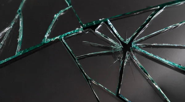 Broken glass. Broken glass background toning.