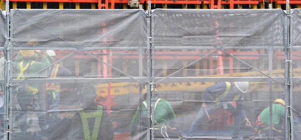 Construction worker in Construction site background