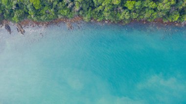Havadan görünüm fotoğraf, isl üzerinde okyanus ve kaya ile Tropikal plaj