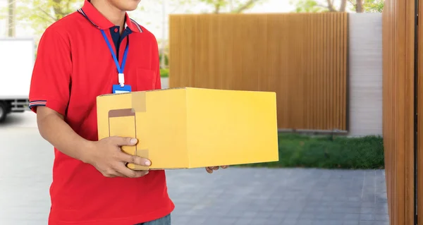 Delivery service boxes package from delivery man — Stock Photo, Image