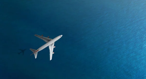 Aerial top view of Airplane flies over a sea, view from above — Stock Photo, Image