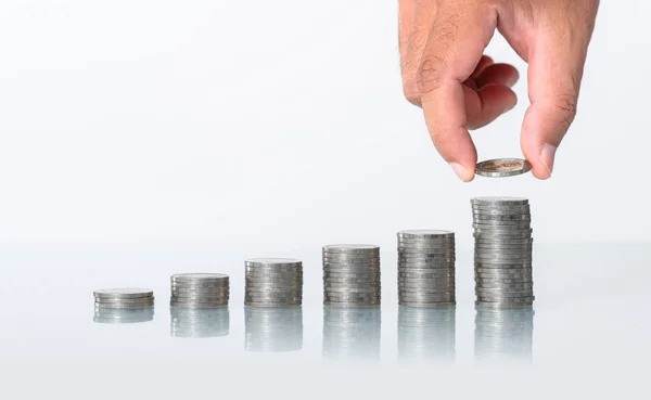 The concept of saving money, Hand putting money coins stack grow — Stock Photo, Image