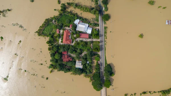 Aerial top view of Flooded rice paddies and the village, View fr