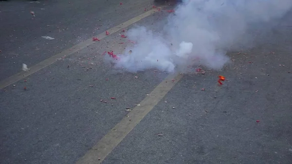 Firecrackers in the streets of hua hin in thailand — Stock Photo, Image