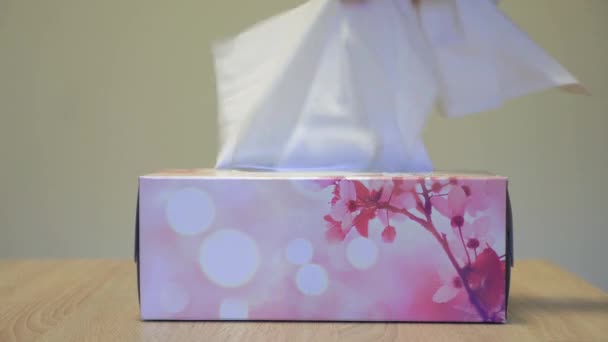 Pulling out tissues from the tissue box — Stock Video