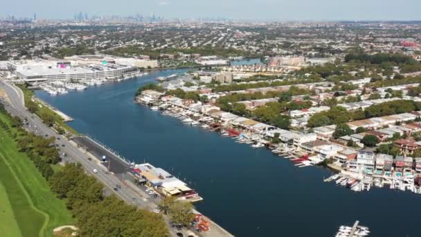 Aerial view of golf course, marina, city and ocean 4k — Stock Video