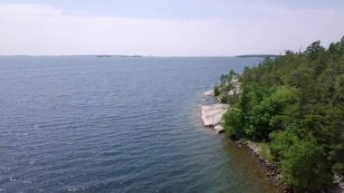 Uçan uçak yukarıda Gürcü bay Huron Gölü ile