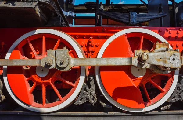 red steam locomotive wheels, metal wheels of an old steam locomo