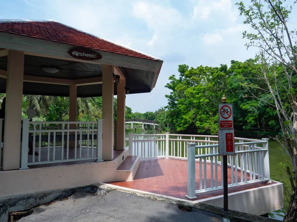 Pavilion mid water are resting point,Surrounded by nature,Beautiful white clouds sky,At Sri Nakhon Khuean Khan Park and Botanical Garden in Bangkok Thailand