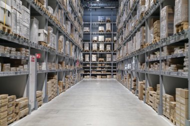 The warehouse full of goods, boxes and shelves in order clipart