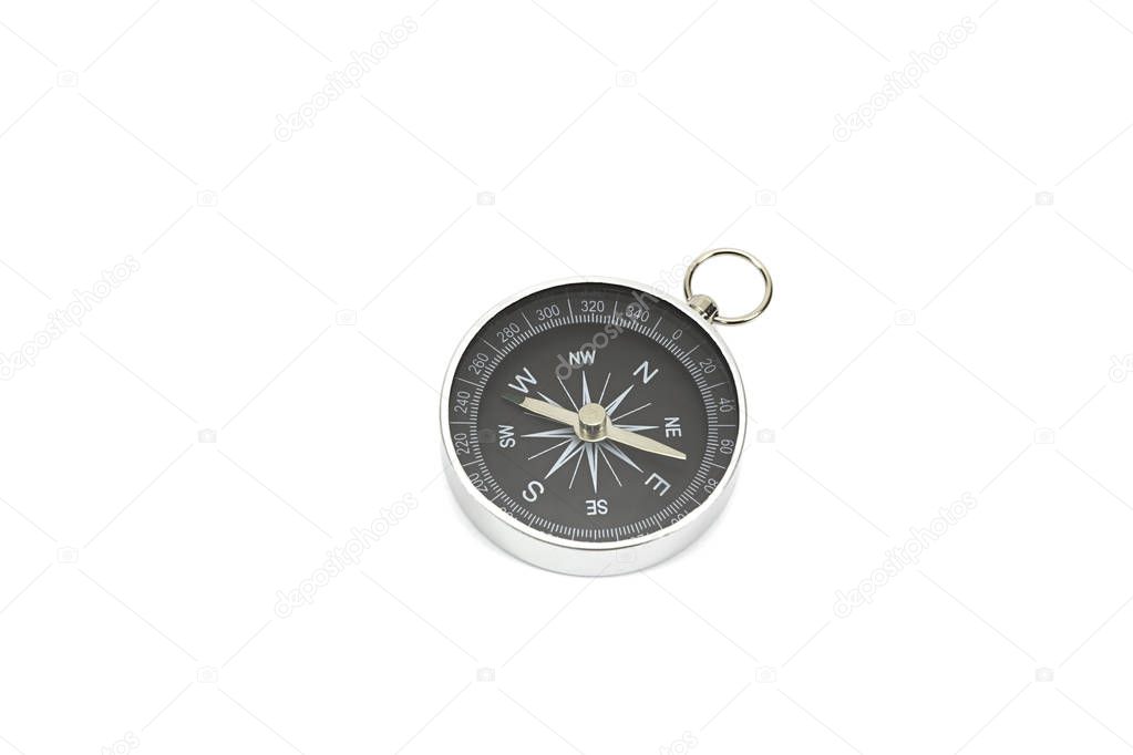 Concept of travel, adventure, expedition, business, choice and possibilities - a metal compass isolated on white