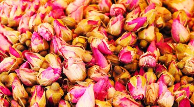 Çay süslemek için kurutulmuş çiçekler. Harika bir arka plan. Gıda.