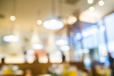 İnsanlar rahatlamak akşam yemeği için soyut bokeh ışık arka plan ile odak veya mevsimlik Restoran.