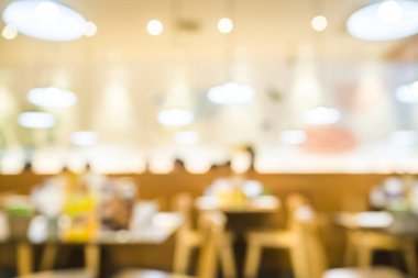 İnsanlar rahatlamak akşam yemeği için soyut bokeh ışık arka plan ile odak veya mevsimlik Restoran.