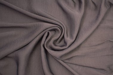 İpek kırışık gri kumaş. Yukarıdan görüntüle. Tekstil ve doku kavramı-yakın kadar kırışık ipek gri dalgalı kumaş arka plan