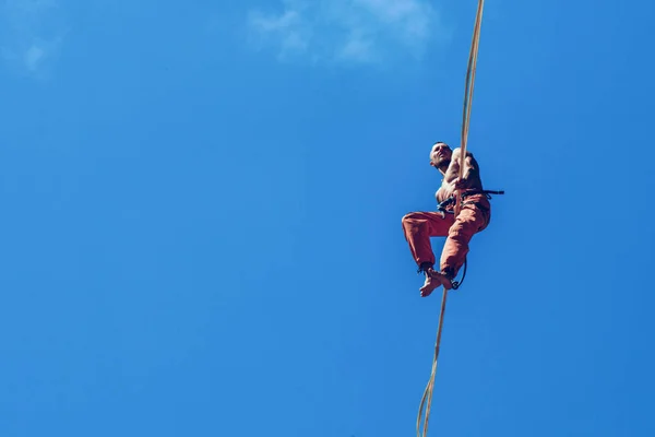 Man on high line.