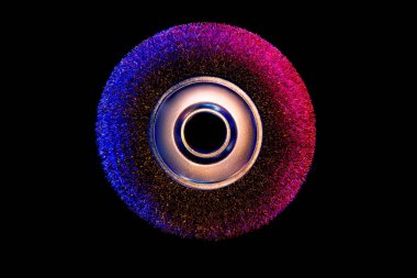 Neon cxolored disk.