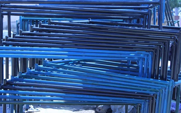 blue color of wrought iron bed frame at the market