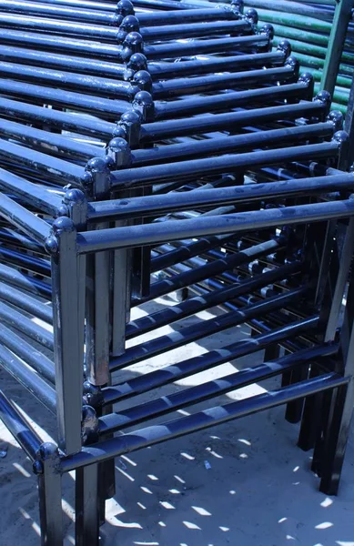 black wrought iron bed legs with shadow in the market shop