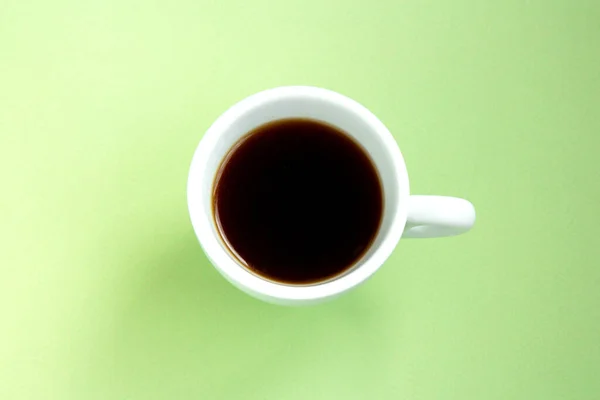 Café negro en una taza blanca — Foto de Stock