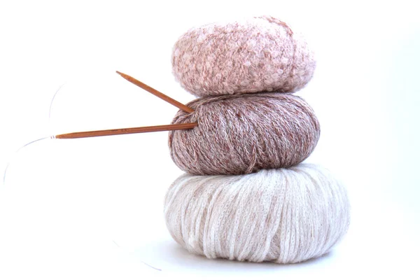 Three Balls Of Beautiful Delicate Yarn And Knitting Needles On A Bright Background Craft On White Background Knitwear As A Concept Of Female Hobby Stock Images Page Everypixel