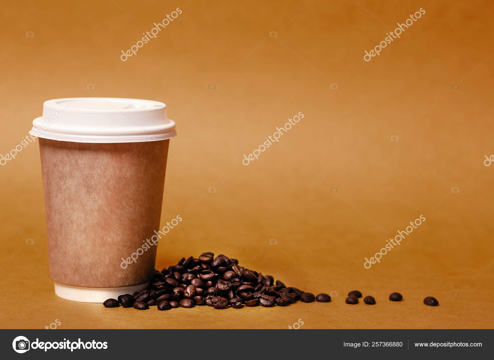 Paper cup and grains of coffee Stock Photo by ©photability 257366880