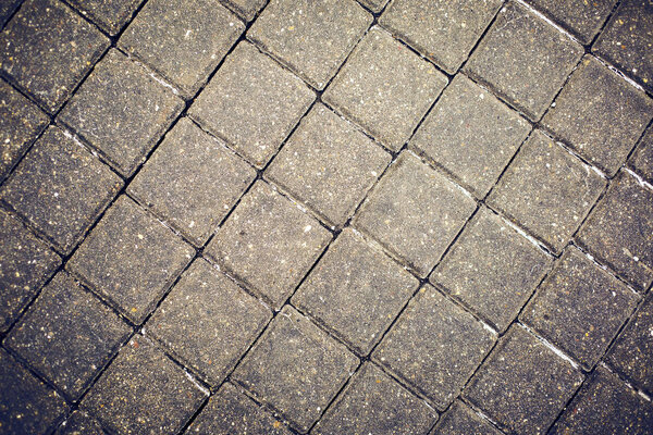 Road gray tiles and stone pavement texture